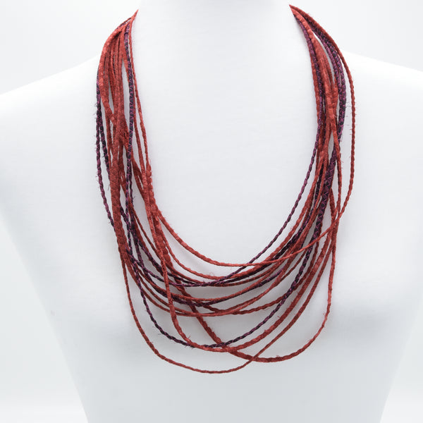 artisan hand crafted long necklace with 14 cords hand sewn from cotton batik fabric
