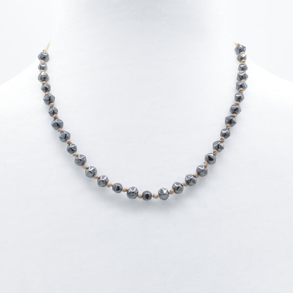 artisan designed and hand crafted short necklace with beads individually hand knotted on a cotton cord
