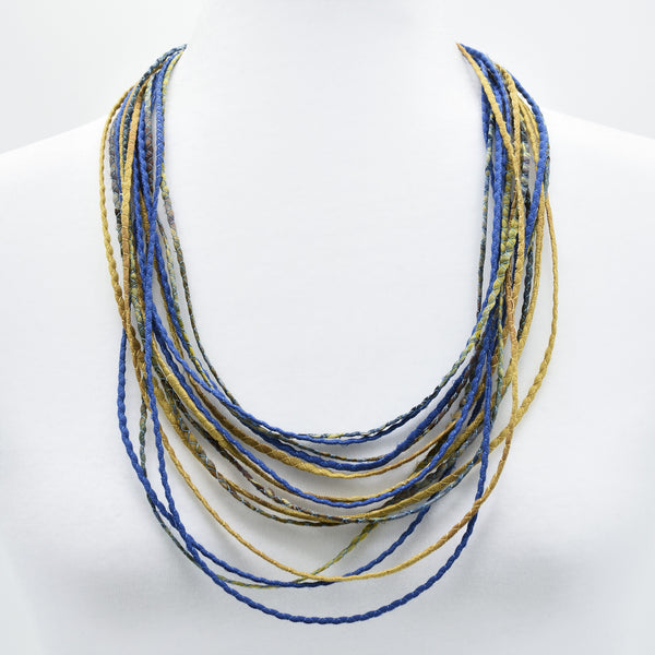 artisan hand crafted long necklace with 14 cords hand sewn from cotton batik fabric