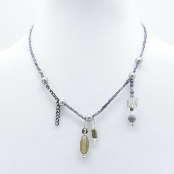 artisan hand crafted short with a cord sewn from cotton batik fabric embellished with crystals and beads