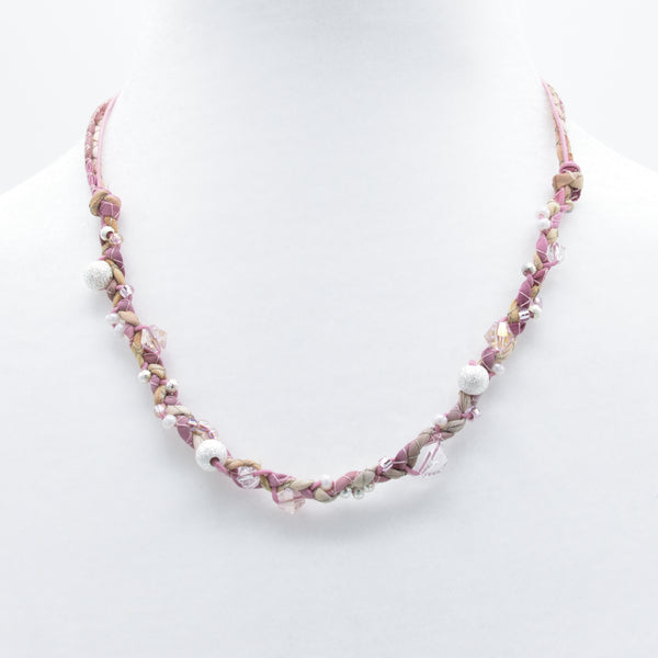 artisan crafted short necklace with hand sewn cords from cotton batik fabric braided with cotton cords embellished with crystals and beads