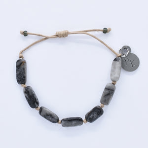 artisan designed and han d crafted bracelet with wood beads connected with crystal beads  